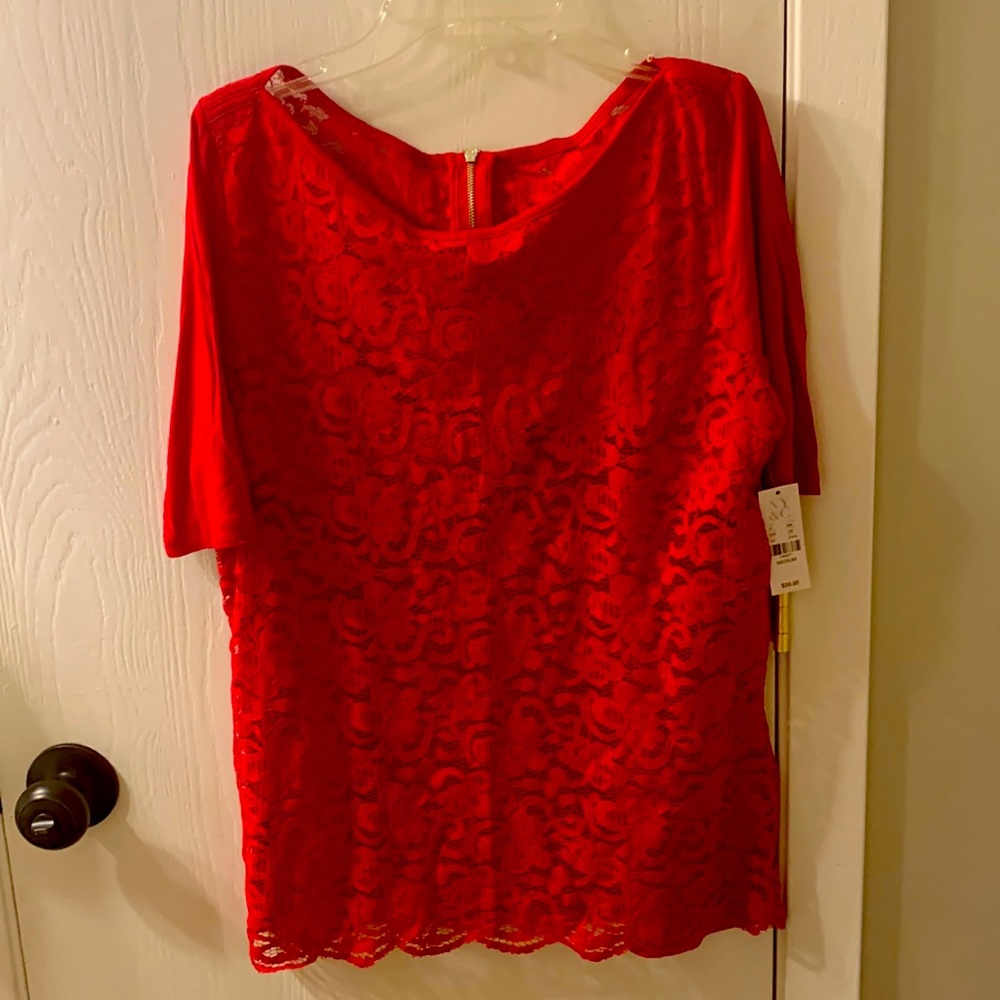Light weight red top, zipper halfway in back.